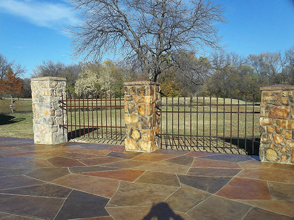 Man-made stone columns faded from sun exposure, renewed with CPI Silane Siloxane